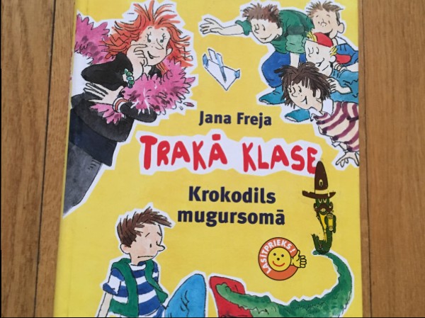 Trakā klase:Krokodils mugursomā