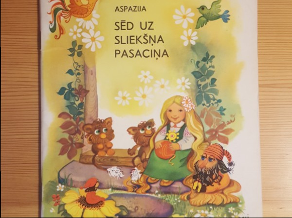 Sēd uz sliekšņa pasaciņa