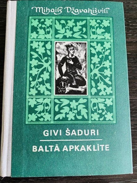 GIVI ŠADURI. BALTĀ APKAKLĪTE