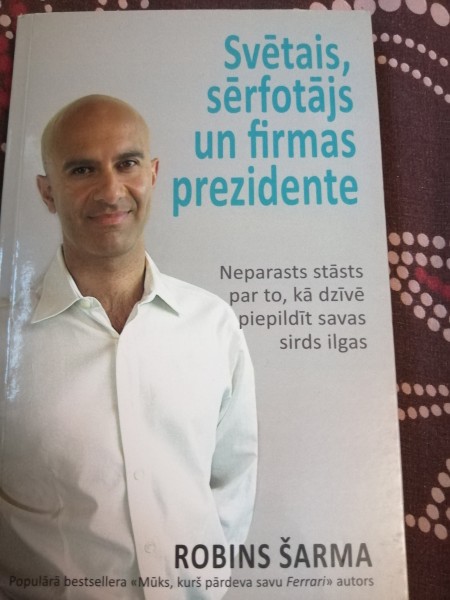 Svētais sērfotājs un firmas prezidente