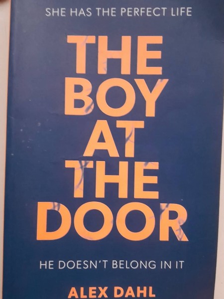 The Boy at the Door