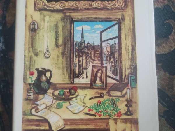 Sarkans pīlādžkoks līkst pāri straumei