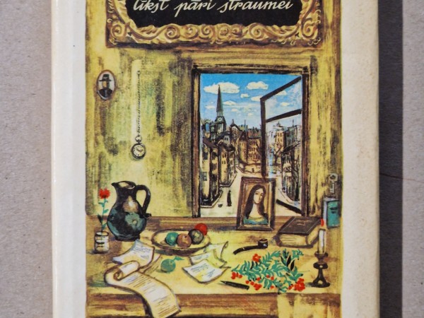 Sarkans pīlādžkoks līkst pāri straumei