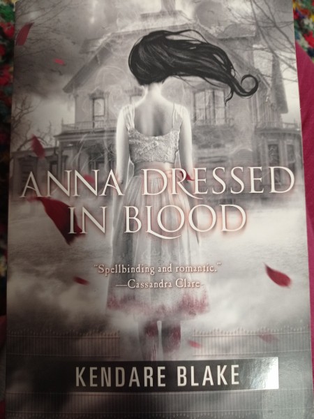 Anna dressed in blood