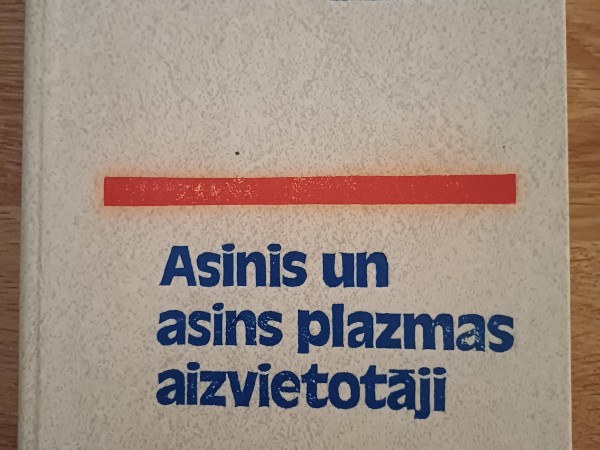 J. Slaidiņš un S. Purne