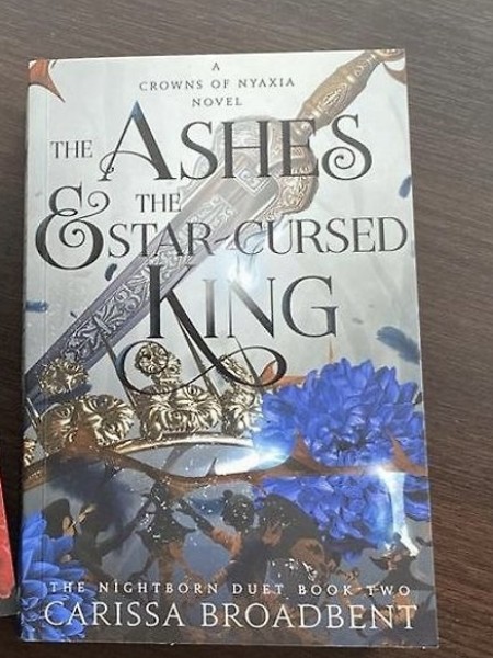 THE ASHES AND THE STAR-CURSED KING